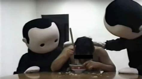 Screenshot 2025-04-17 at 17-15-33 Dark web video of two guys forcing one guy to eat a soup at ...png